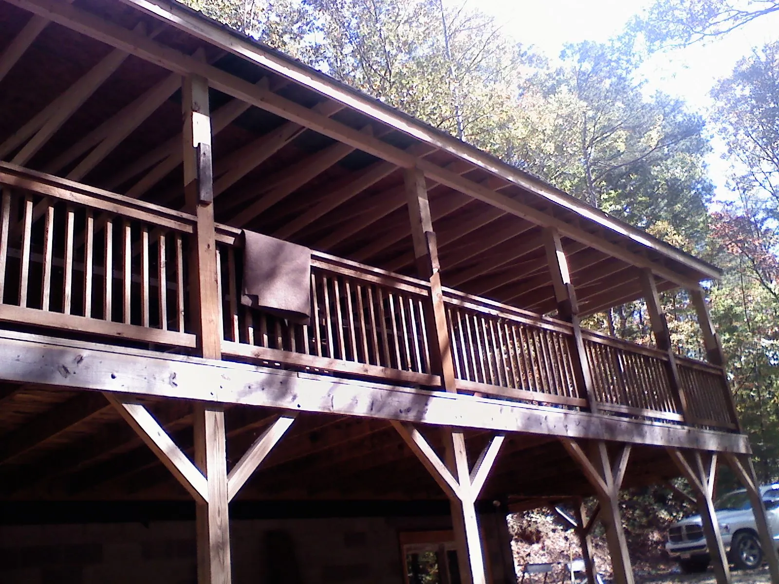 Timber framing under a new elevated porch and deck — Roof Leak Repair in Hooks by Roofing Brothers